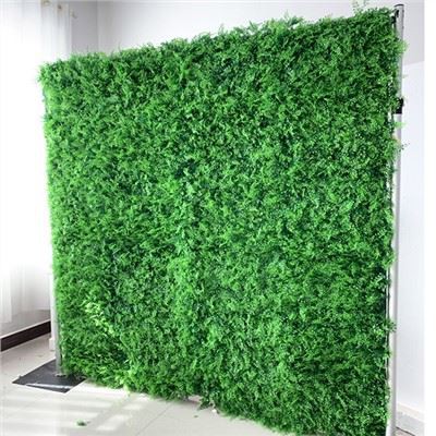 Toile de fond de mariage de mur d'herbe
